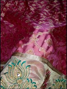Reddish pink party wear organza tissue silk saree