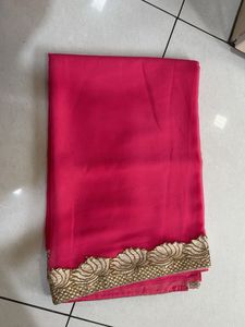 Elegant Pink Saree with Gold Border