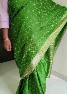 Elegant Green Silk Saree with Intricate Motifs