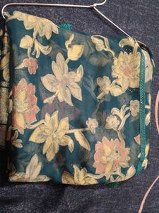 Teal Green Saree with Woven Zari Floral Design