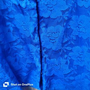 Elegant blue lace blouse with a back open