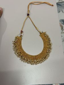 Elegant Gold Necklace with Pearls