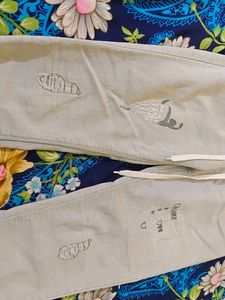 Stylish Light Blue Jeans with Fun Graphics