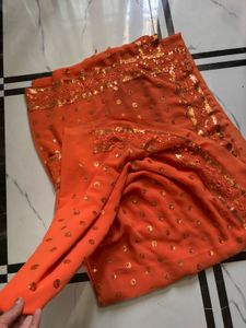 Orange Sequined Saree with attached blouse piece