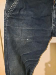 2 numbers of Distressed Blue Jeans