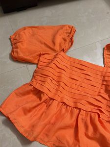 Orange Puff Sleeve Peplum Top