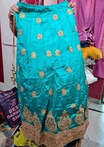 Elegant Teal &amp; Gold Lehengas