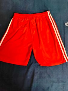 RED football and basketball shorts
