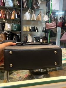 Chic Black Handbag with Bow Detail