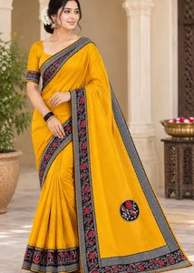 Elegant Yellow Saree with Floral Embroidery