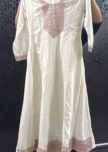 Elegant White Kurta with Embellished Neckline