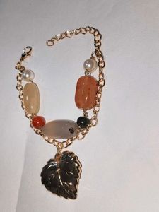 Charming Beaded Bracelet with Leaf Charm
