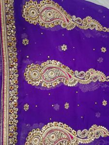 A Purple Blue Saree With Heavy Work