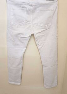 Ripped White Jeans