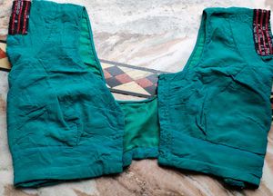 Elegant Teal Saree with Floral Embroidery