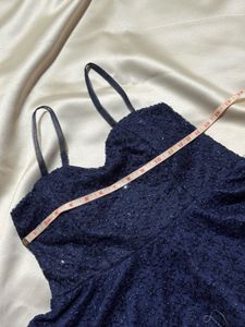 Navy Sequin Peplum Top