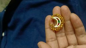 Elegant Gold Nath with Green Stones