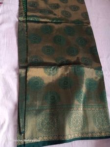 Elegant Silk Saree with Green Motifs