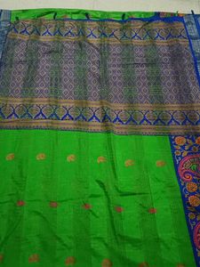 Vibrant Green Silk Saree with Blue Border