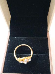 Elegant Gold Ring with Clear Stones