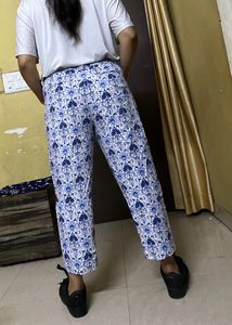 It Is A Cotton Stretch Trousers . Blue Motives With White Base. It Is Slightly Stretchable. Comfortable Fit. Grab It Fast !