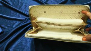 Elegant Wallet with Tassel Detail