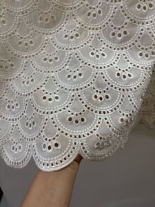 White Eyelet Sleeveless scallop hem top