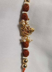 Designer Rakhi with Om Pendant