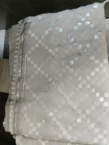Elegant White Saree with Silver Motifs
