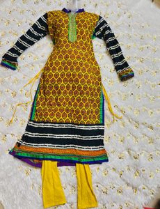 Vibrant Yellow Kurta Set with Striped Sleeves