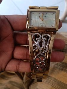 Elite women.s gold &amp; silver bangle watch