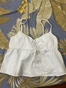 White peplum top