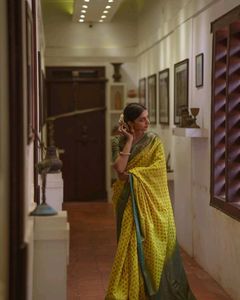 Vibrant Yellow Saree with Paisley Border