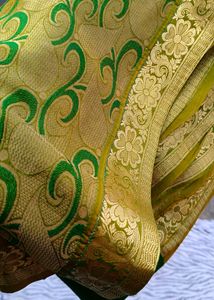 gold and green colour saree