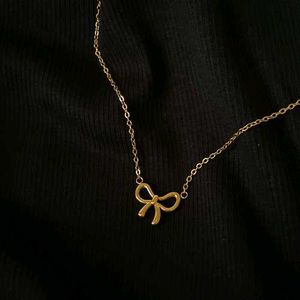 Gold Bow Necklace