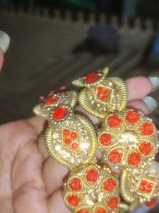 Golden Bangle with Red Stones