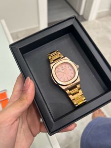Elegant Rose Gold Watch with Pink Dial