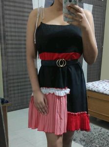 Black Dress With Colorful Ruffle Details