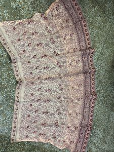 Unstitched Peach Embroidered Lehenga Choli