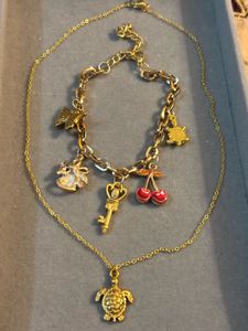 Charming Gold-Tone Charm Necklace & Bracelet Set
