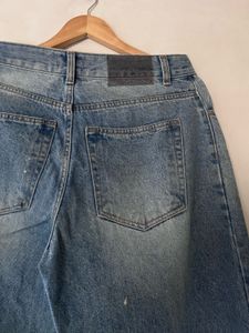 Distressed Blue Denim Jeans