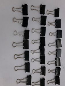 1 Box Containing 23 Black Binder Clips