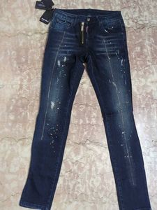 Stylish Dark Wash Jeans with Unique Embellishments