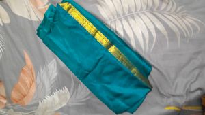 Elegant Teal Saree with Golden Border