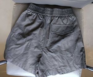 Black Leather Pleated Shorts with Button Detail