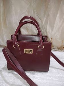 Elegant Maroon Handbag with Shoulder Strap