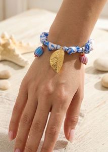 Boho Blue &amp; White Bracelet with Charms