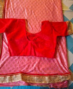 Pink Saree with Red stitched Blouse