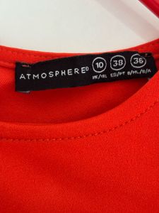 Vibrant Orange Peplum Top
