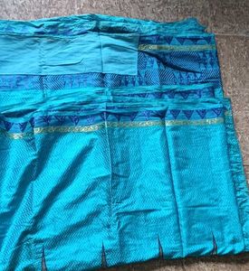 Beautiful Blue Saree with Intricate Patterns